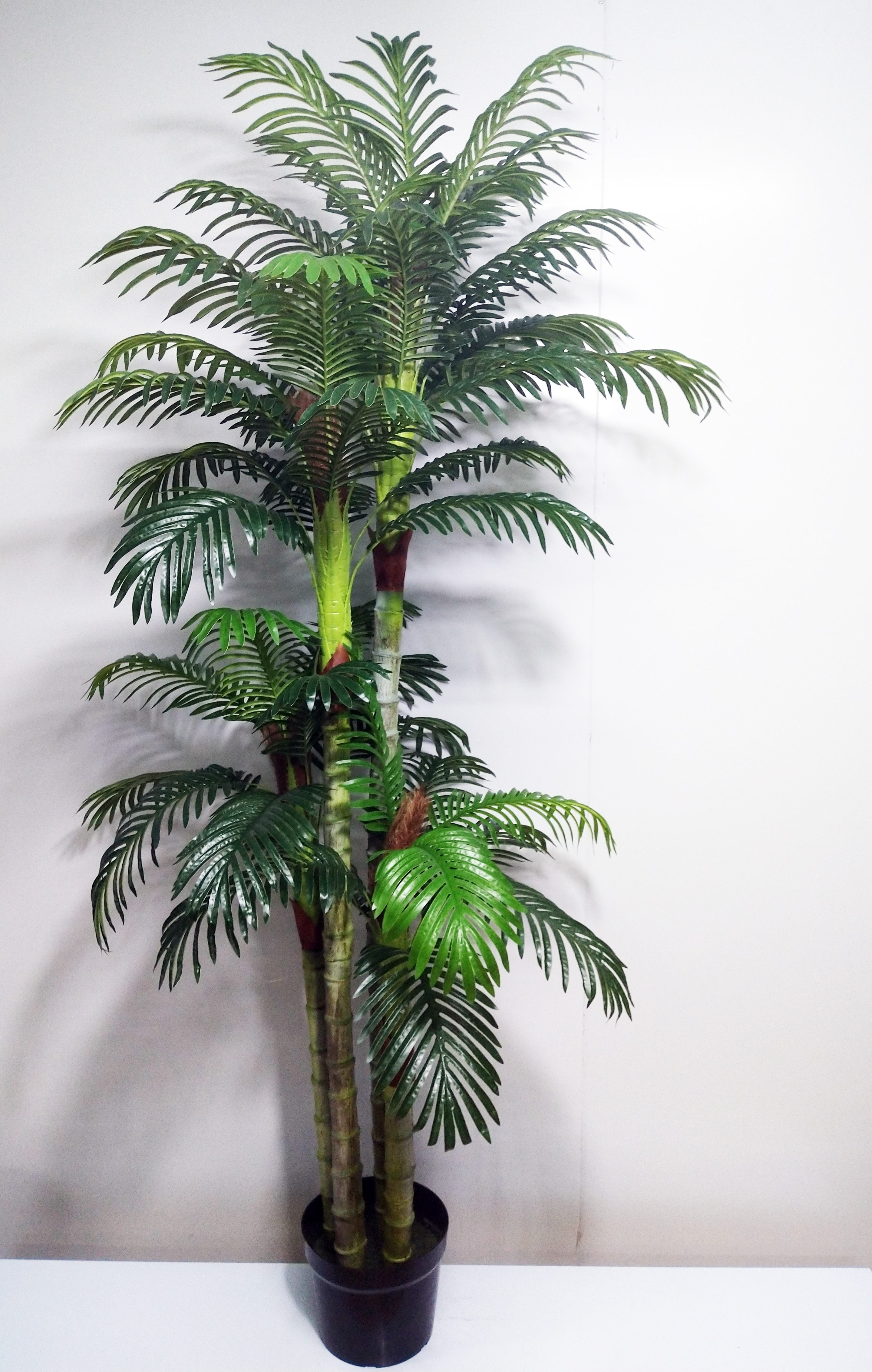 large artificial palm trees indoor
